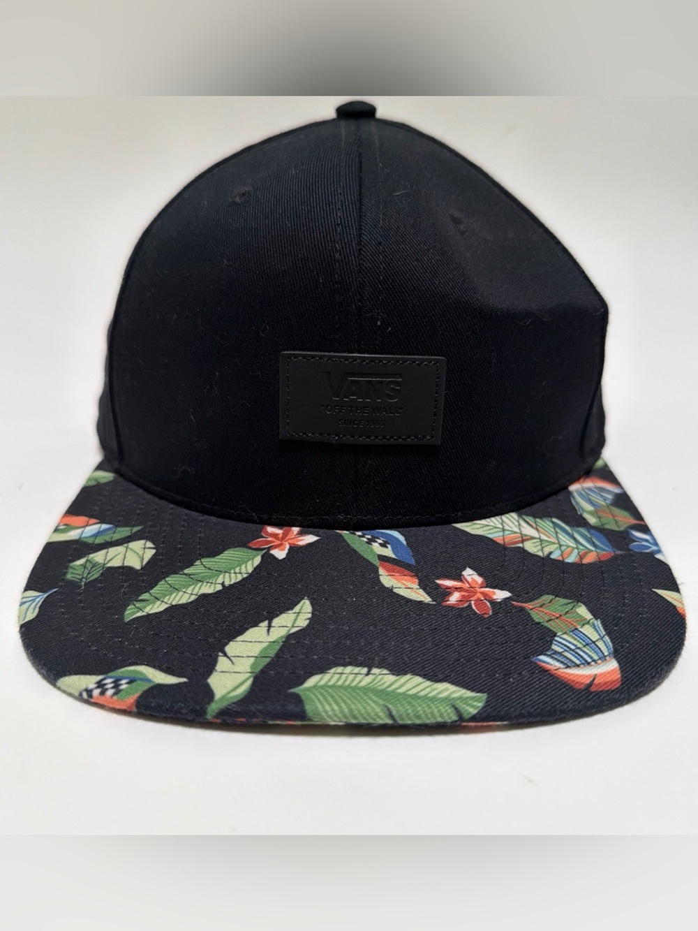 Vans Off The Wall Black Snapback Hat with Tropical Floral Brim